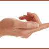 Honey running over a woman's finger  -HR-